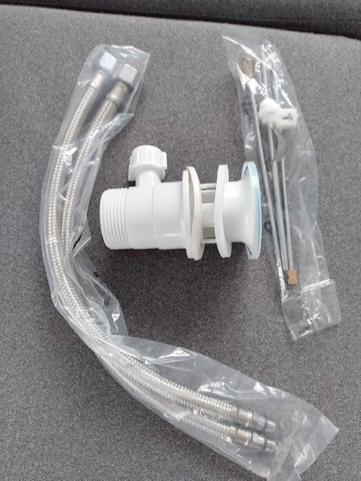 Korki automatyczne do umywalki 2 sztuki + dwa wężyki