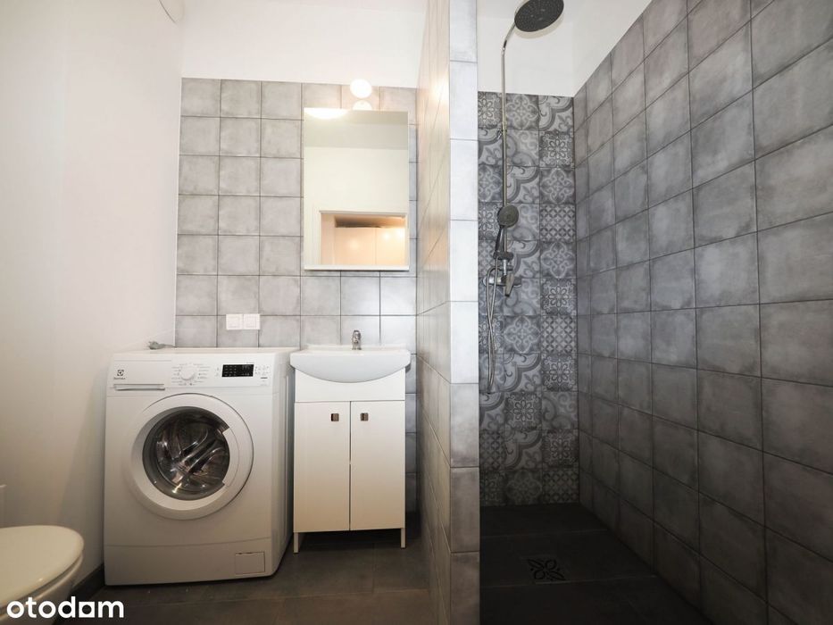 WyjWyjątkowe studio z widokiem na warszawskie City – Union Apartamenty