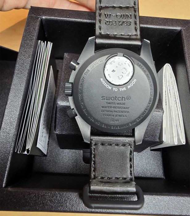 Swatch xOmega Bioceramic Moonswatch Mission To Moonphase Snoopy
Black