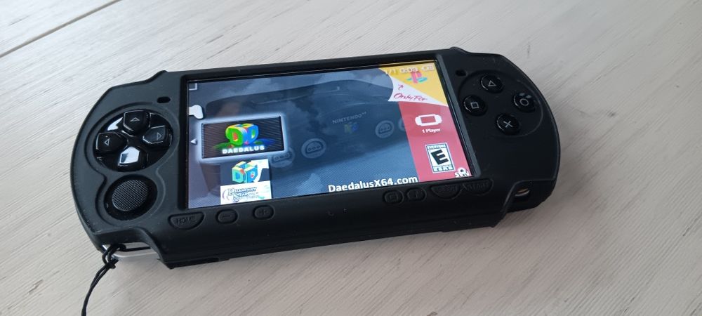 PSP(+200jogos)+protecção de silicone+bolsa