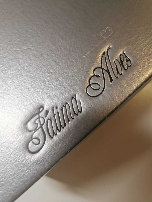 Botins pretas pele de cobra