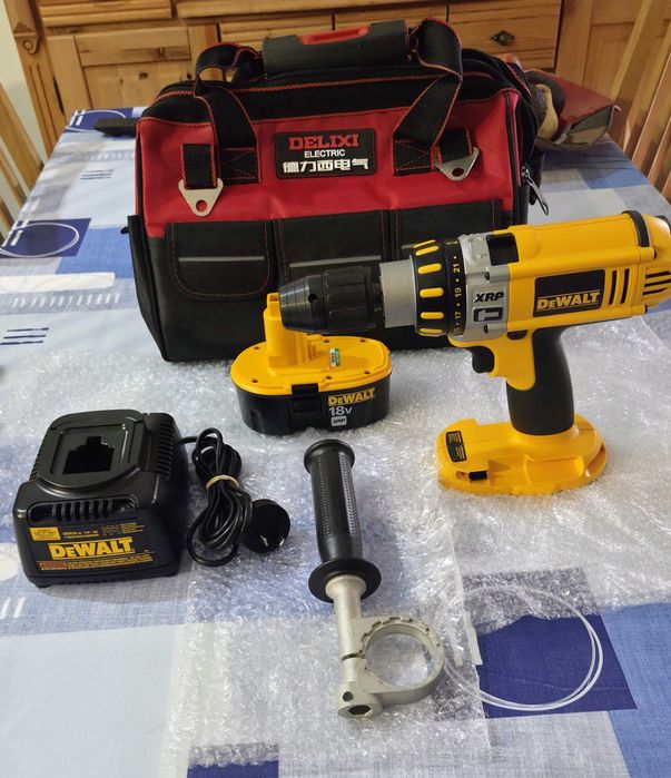 DeWalt Hammer drill DC 925 with charger, battery, and handheld stick