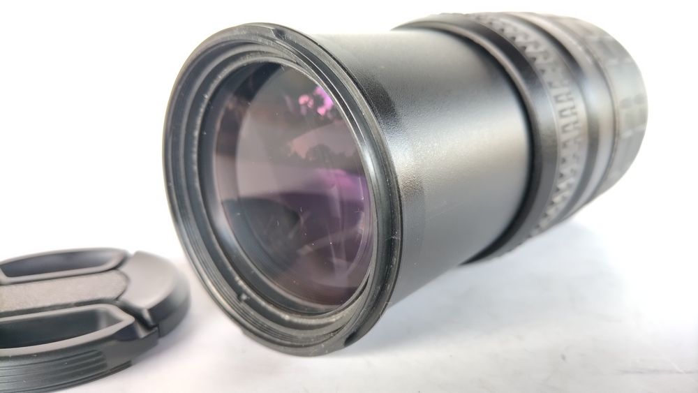 P/ Nikon. Objectiva Quantaray 70-300. Óptima para séries 3000 e 5000