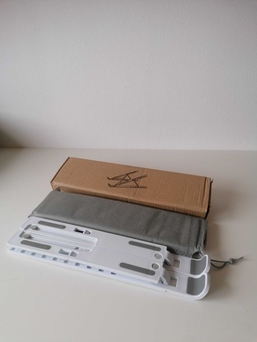 Suporte para portátil dobrável e ajustável, de plástico.64729497976450121