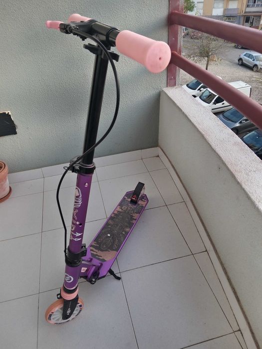 Trotinette  completamente nova,mto pouco uso