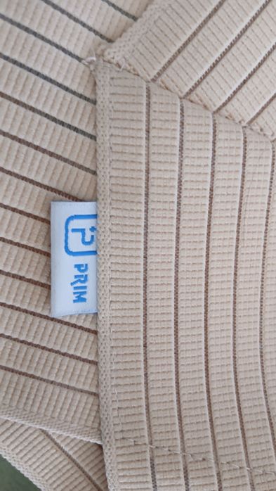 Colete postural para permitir msis mobilidade  e redução  de fores nas costas.