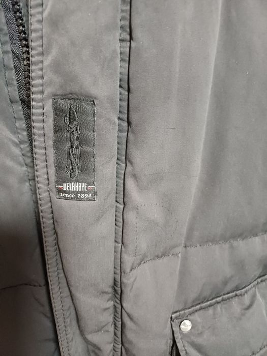 Теплий пуховик з капюшоном