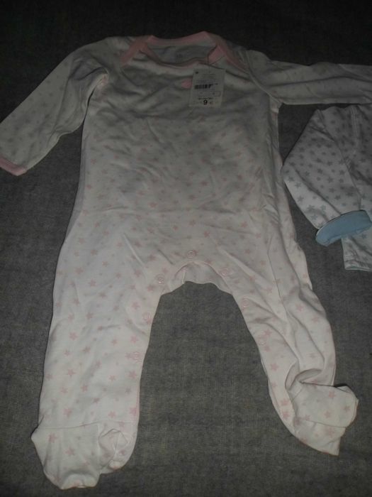 1 casaquinho e 1 bodws novos com etiqueta  para menina