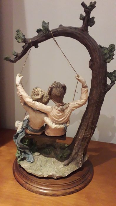 Espetacular estatueta romântica