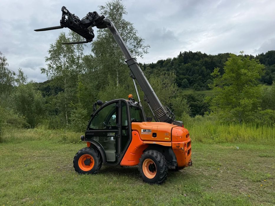 Ausa T204 H. JAPOŃSKA Ładowarka Teleskopowa 4,2 metra Wysuw. Udźwig 2,2 tony. Rozsuwanie wideł HYDRAULICZNE.  Maszyna Jak Nowa z Salonu. Pochodzi z Gospodarstwa Norweskiego! 2017rok. przebieg tylko 3800mtg. Silnik Kubota 4cylindry!  ZERO ZUŻYCIA ORYGINAŁ.