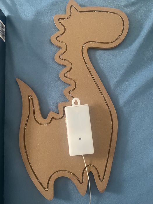 Dinossauro de luz indireta