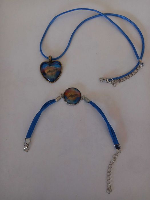 Conjunto pulseira e colar com 2 golfinhos