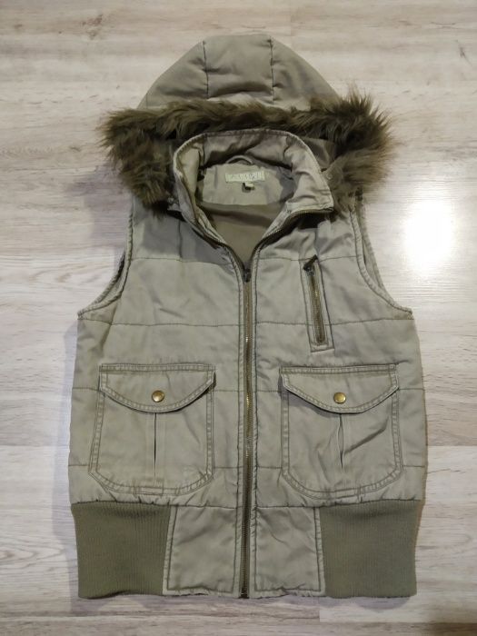 Удобная и практичная жилетка