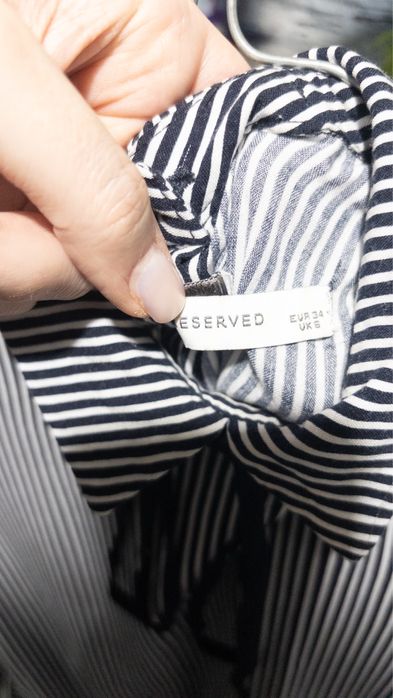 Elegancka bluzka z kołnierzykiem i wiązaniem