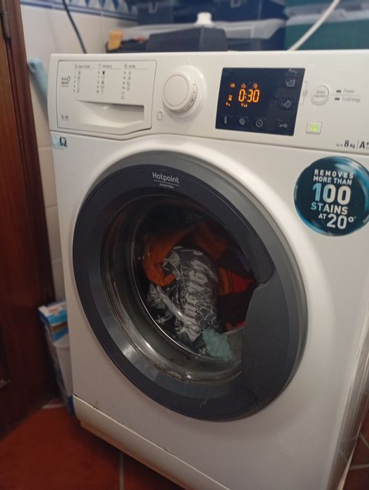 Máquina de lavar roupa usada