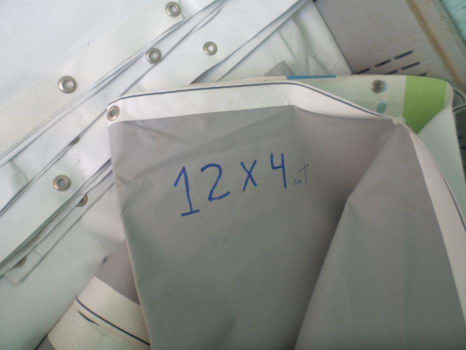 Toldos ou oleados impermeáveis para diversos fins.