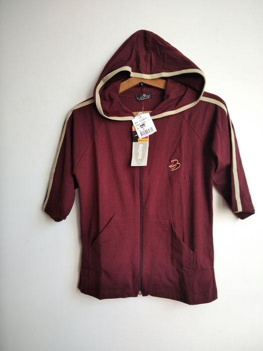 Безрукавка бордового кольору на дівчинку 10-11 років