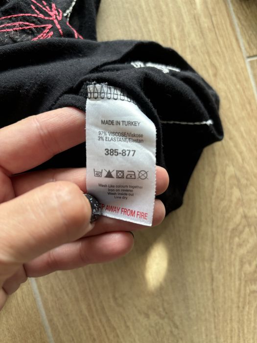 Bluzka Next z aplikacją L