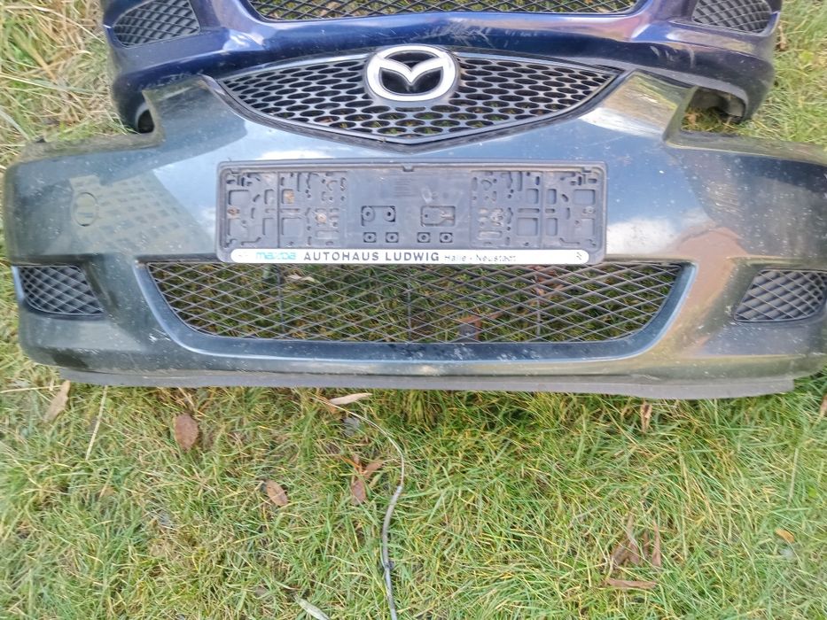 Передній бампер Мазда 3 БК седан хечбек бампер Mazda 3 Bk седан хетчбе