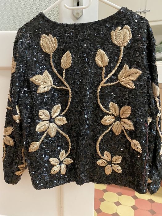 Casaco de lantejoulas 68€