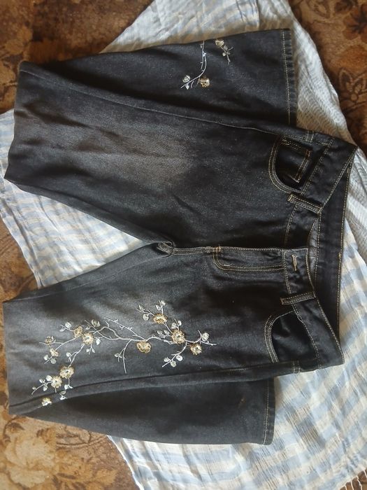 продам штани з вишивкою
