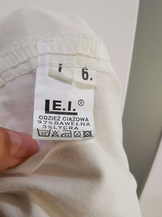 Białe spodnie ciążowe 42 z kieszeniami