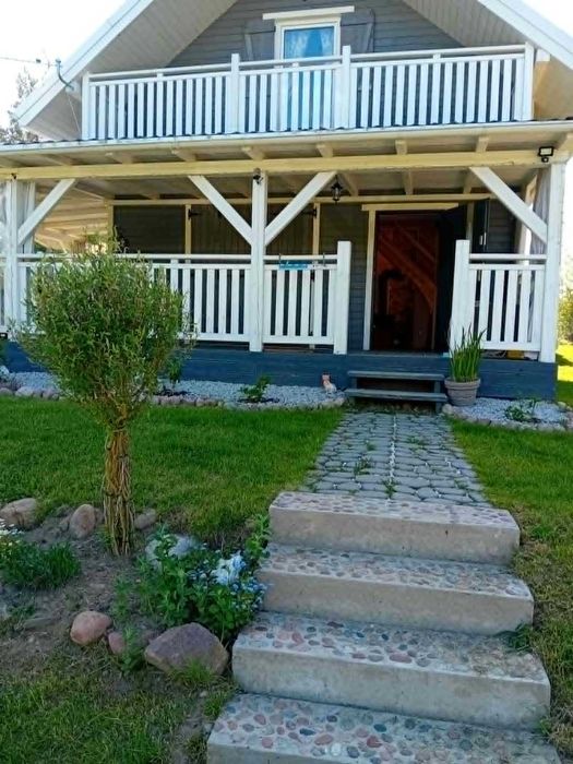 Domek nad Jeziorem Dobra z jakuzzi i dużą ogrodzona działką