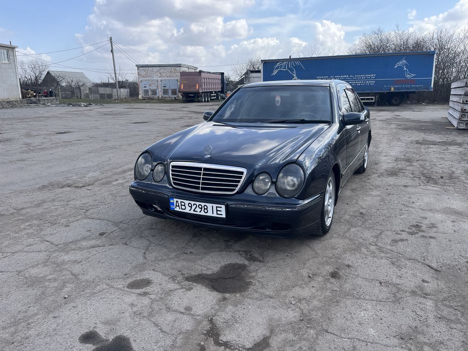 Мерседес Бенз 210