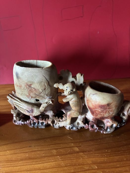 2 esculturas em pedra sabao