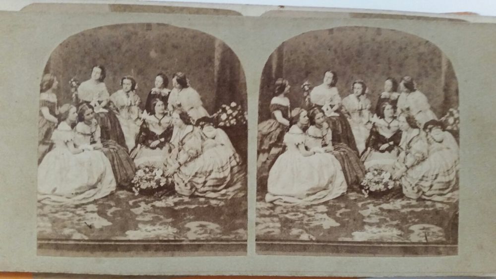 Estereoscópio antigo e fotografias