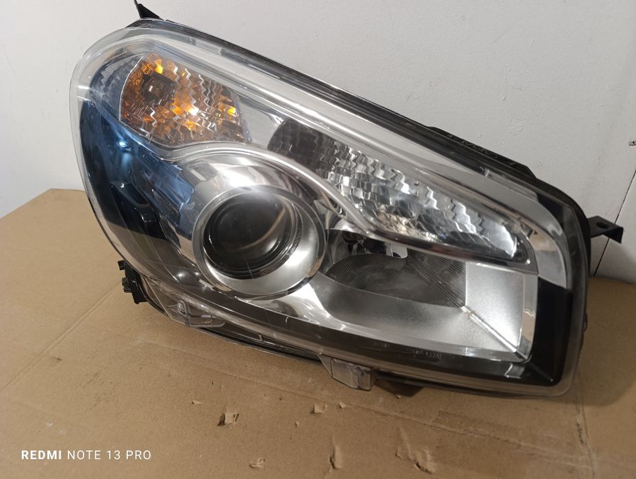 Nissan QASHQAI J10 lift prawa lampa  przednia