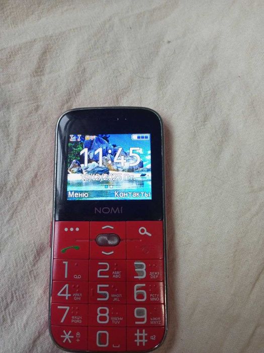 Телефон Nomi i220