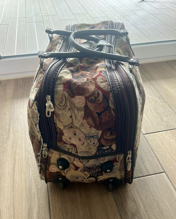 Used rolling suitcase64751017905922121