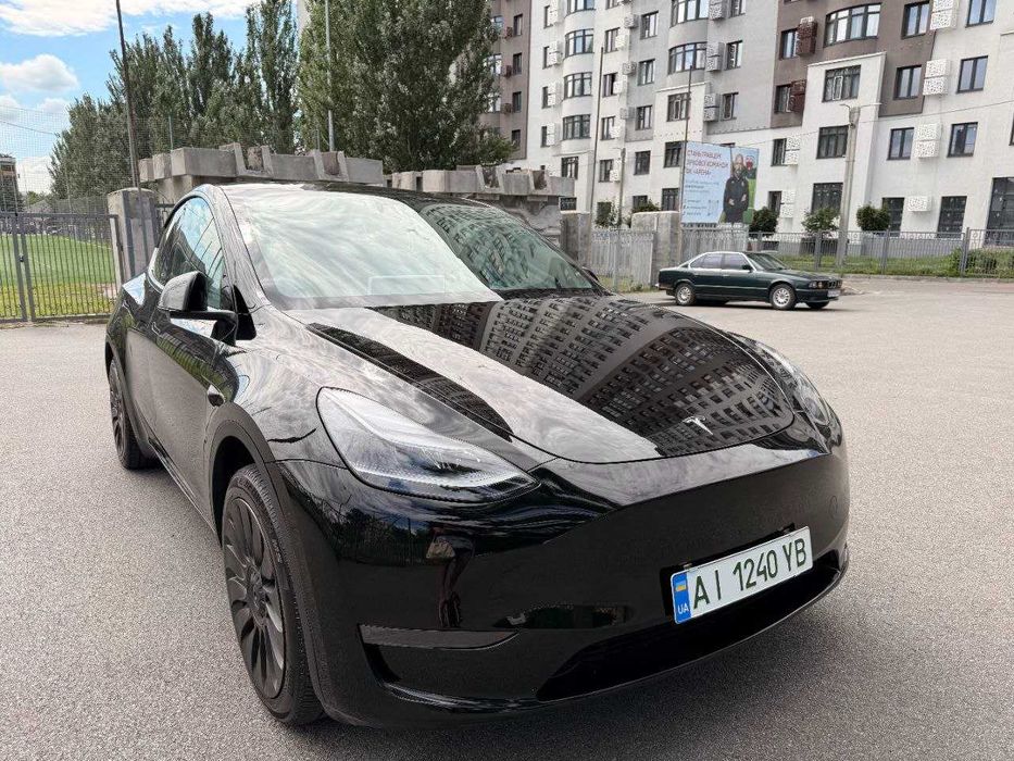 Tesla Model Y 2024 VIN 7SAYGDEE0RA246829 фото оголошення 4 з 18