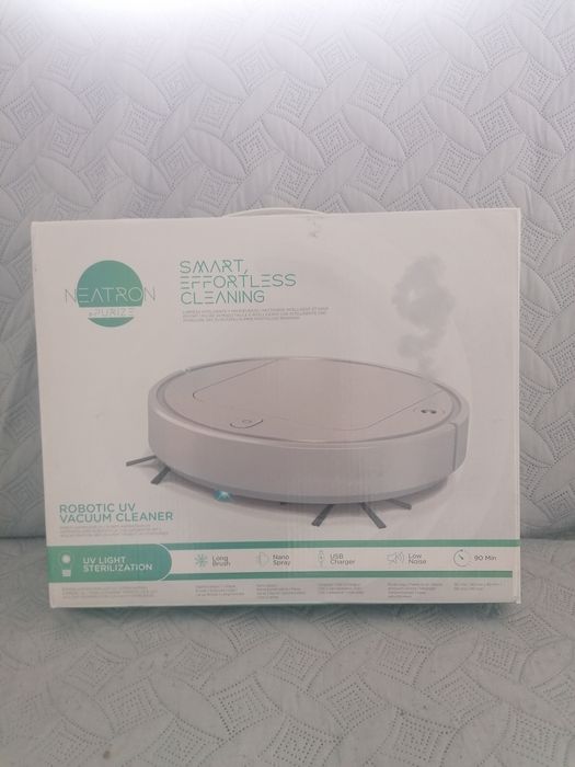 Aspirador robot branco