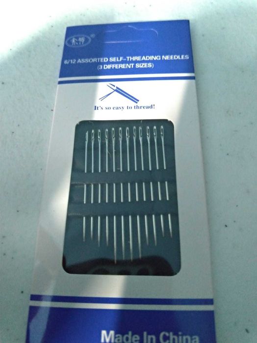 conjunto de agulhas de coser entrada da linha facilitada