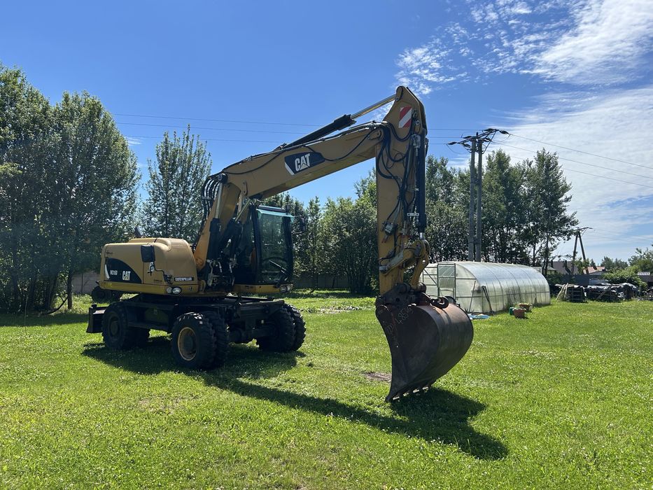 Caterpillar CAT M 316D 8000mth z Niemiec stan bdb. 313, 315