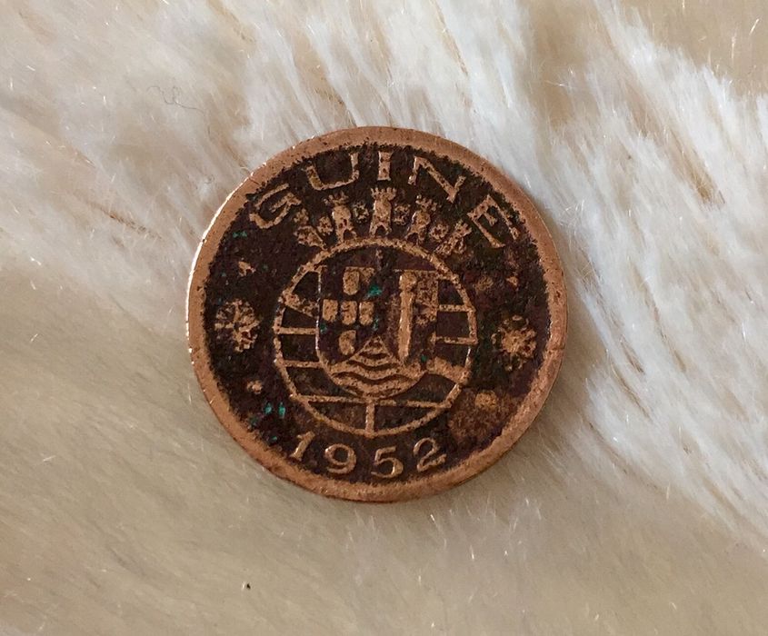 Numismática, moeda 50 centavos guiné