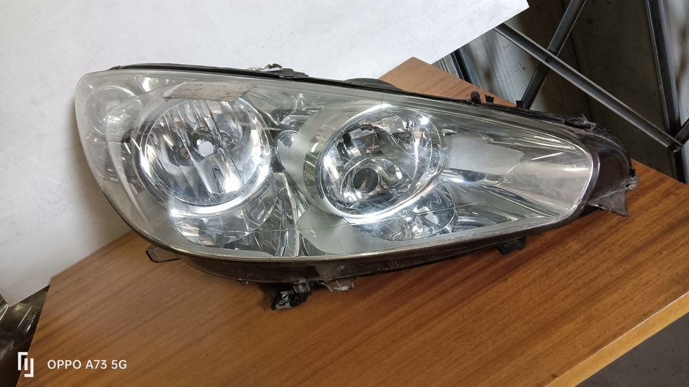 Farol Peugeot 308 ótica direita 2008