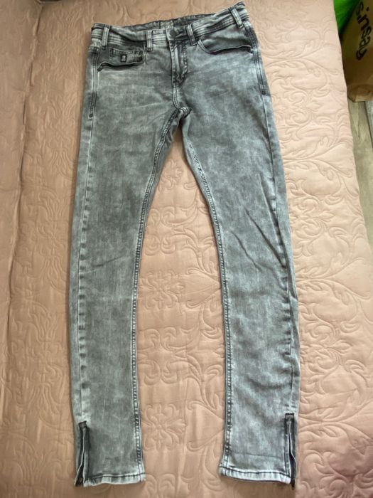 Spodnie jeans Cropp