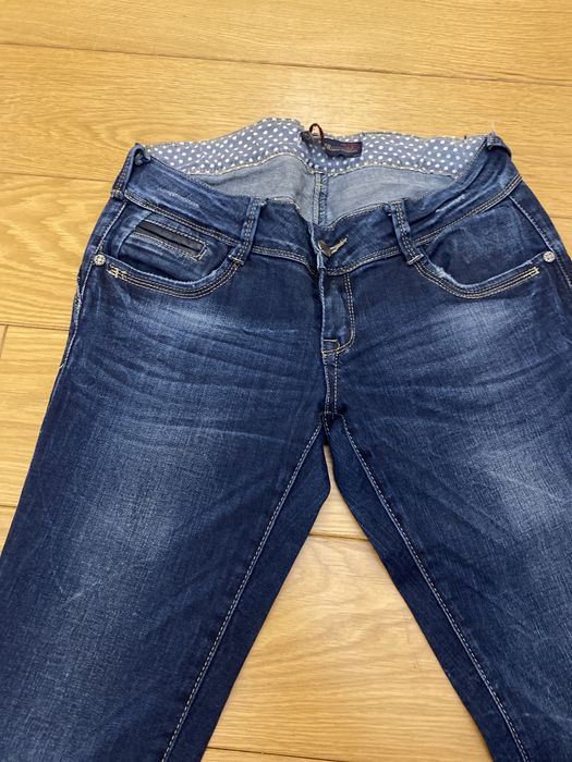 Jeansy 38 granat
