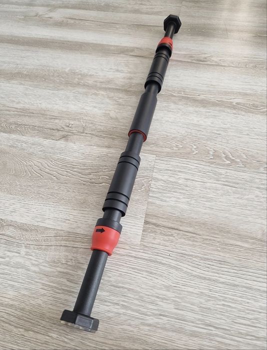 Drążek do podciągania rozporowy 65-100 cm stalowy 150 kg stabilny nowy