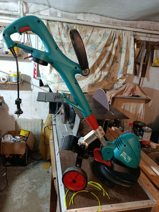 Тример коса bosch art 26 combitrim з колесами і запасними жилками