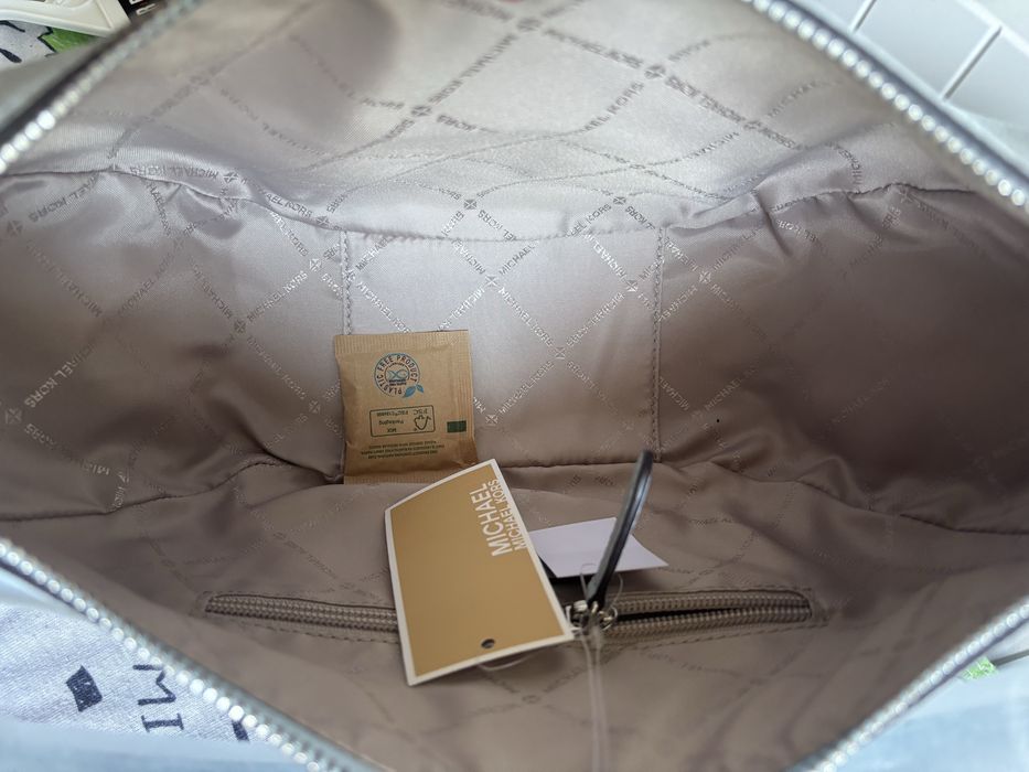 Torebka na ramie Michael Kors Merrit medium blekitna zamsz naturalny srebrne logo