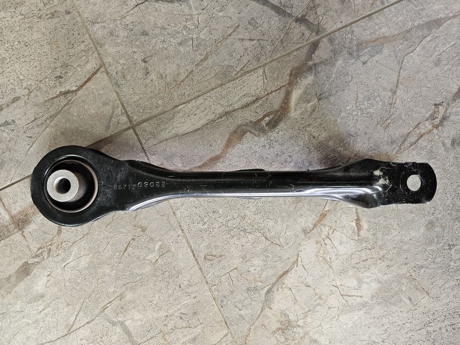 Рычаг Tesla 1044427-00-C