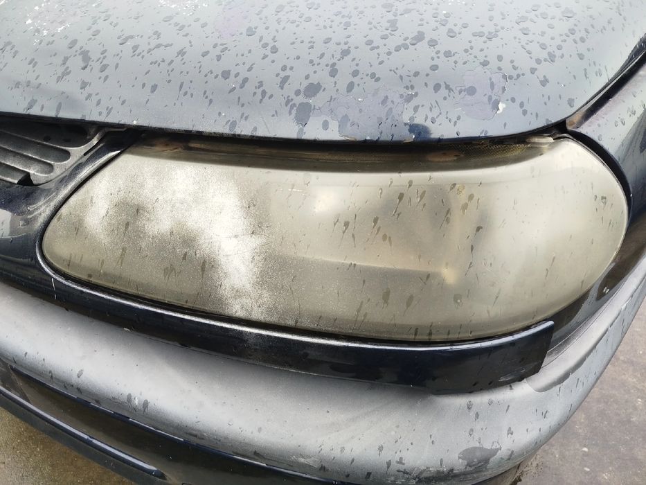 Ótica / farol esquerda RENAULT Laguna I (B56_, 556_)