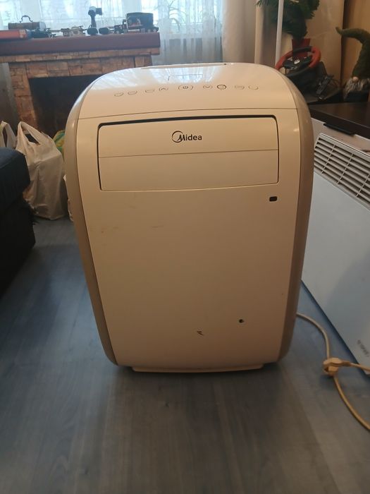 Мобильный кондиционер  Midea.