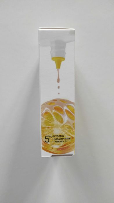 Krem fluid z witaminą C Wonder Tint Garnier Vitamin C SPF50+ Light