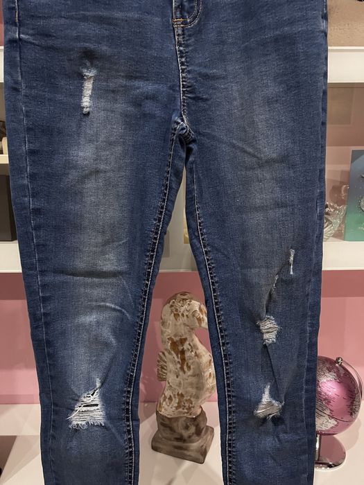 Nowe spodnie jeansowe Reserved r. S
