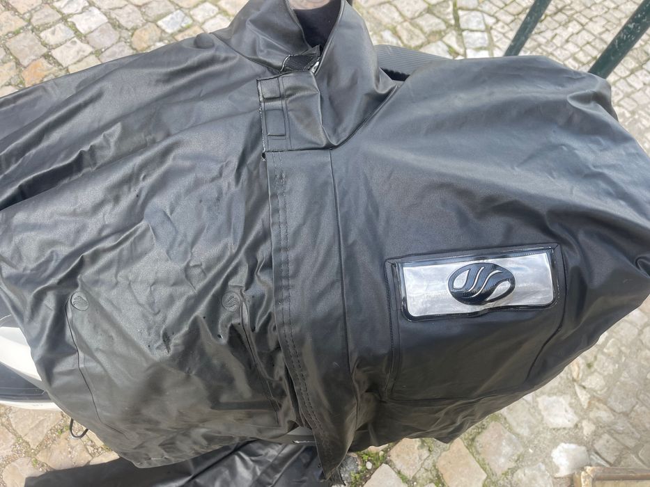 Capa de chuva e Galochas